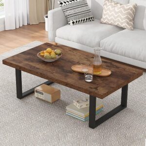 Farmhouse‑style rustic wooden coffee table with modern industrial rectangular shape.
