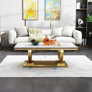 Gold rectangular center table with black top and mirrored geometric legs.